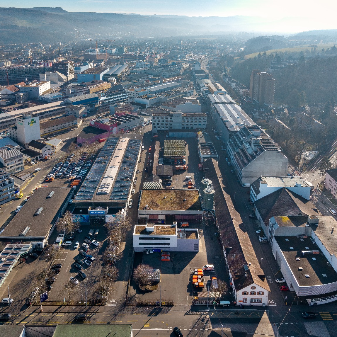 Auf Basis der «Vision Dreispitz» wird an einer bikantonalen Nutzungsplanung gearbeitet. In dieser Zeit wird das Freilagerquartier realisiert. 2014 erkennt die CMS, dass das Vorhaben aufgrund seiner Komplexität weder wirtschaftlich tragbar, noch juristisch und politisch umsetzbar ist. Sie kündigt den städtebaulichen Rahmenvertrag.